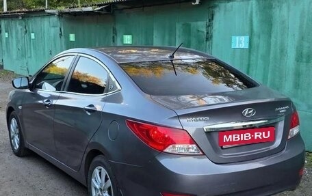 Hyundai Solaris II рестайлинг, 2011 год, 740 000 рублей, 3 фотография