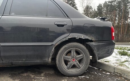 Mazda 323, 2003 год, 125 000 рублей, 4 фотография