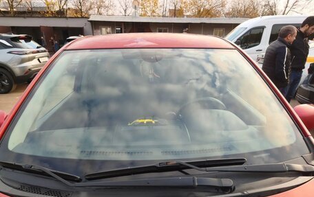 Nissan Tiida, 2011 год, 850 000 рублей, 4 фотография