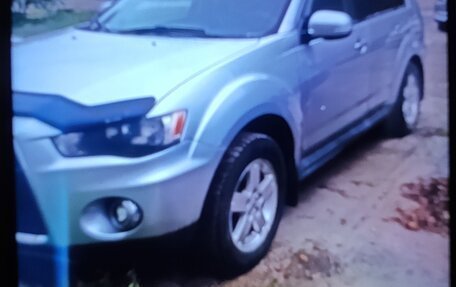 Mitsubishi Outlander III рестайлинг 3, 2011 год, 750 000 рублей, 2 фотография