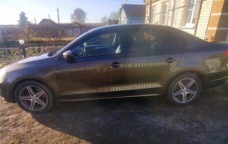 Volkswagen Jetta VII, 2011 год, 750 000 рублей, 6 фотография