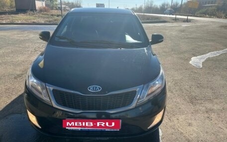 KIA Rio III рестайлинг, 2012 год, 670 000 рублей, 2 фотография