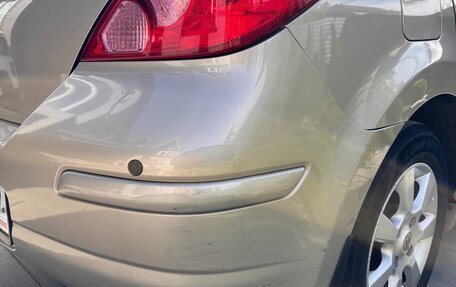 Nissan Tiida, 2010 год, 900 000 рублей, 9 фотография
