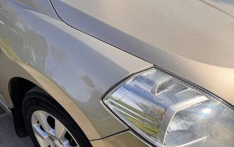 Nissan Tiida, 2010 год, 900 000 рублей, 8 фотография