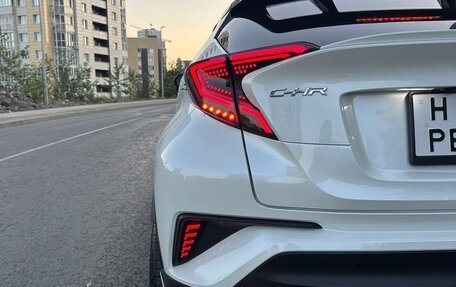 Toyota C-HR I рестайлинг, 2018 год, 2 350 000 рублей, 27 фотография